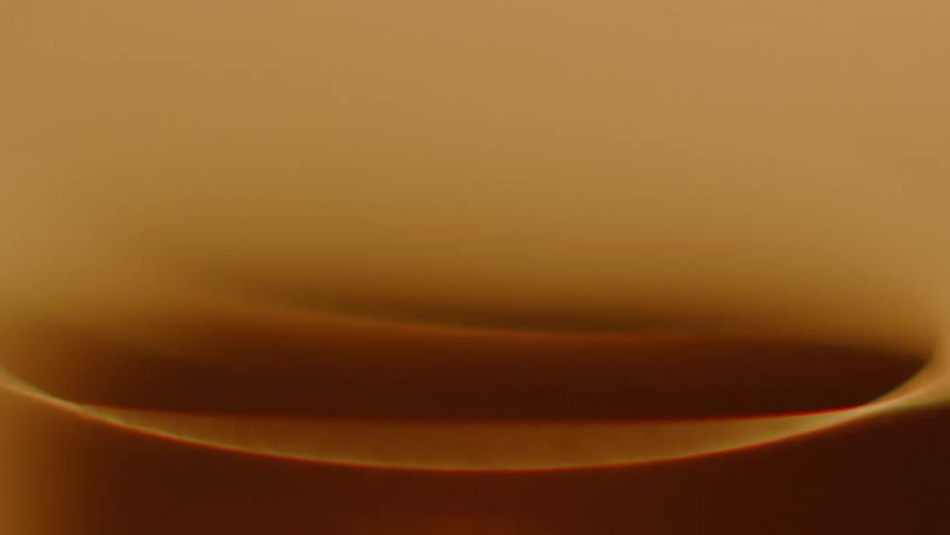 A fire that is burning and causing light to flicker
