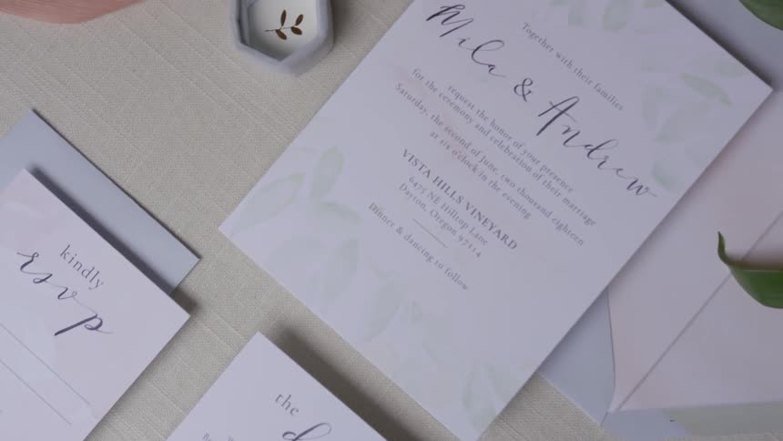 A lot of invitations sitting on a table