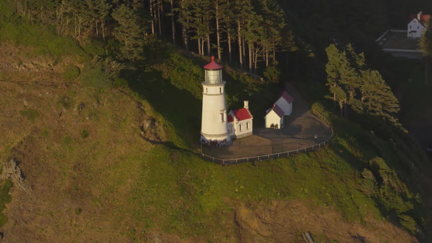 A lighthouse is in a rural area