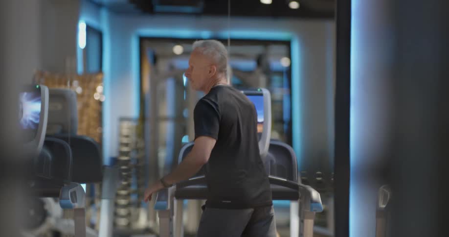 A man is working out at a gym
