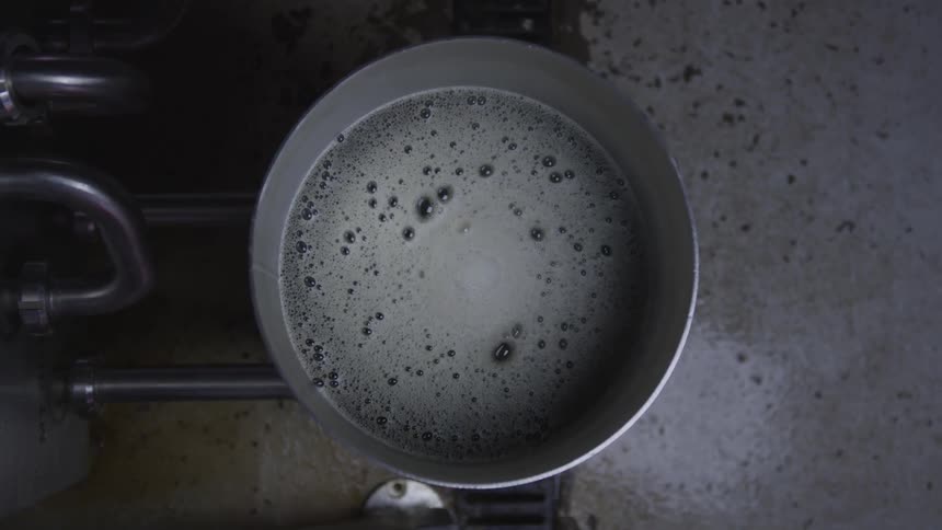 Coffee rotates in a cup