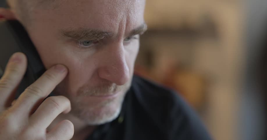 Man holding a phone to his ear