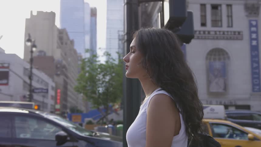 A woman is walking in the city
