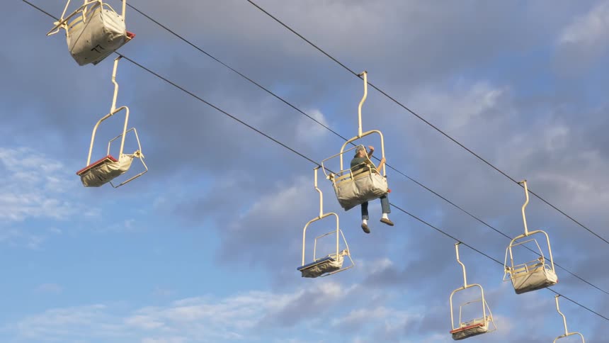 The lift is carrying people in the sky