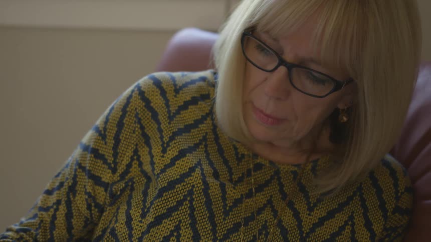 A woman sitting in a chair