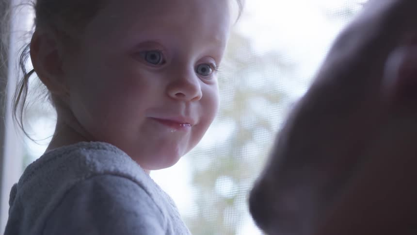 Father And Daughter Playing At Home