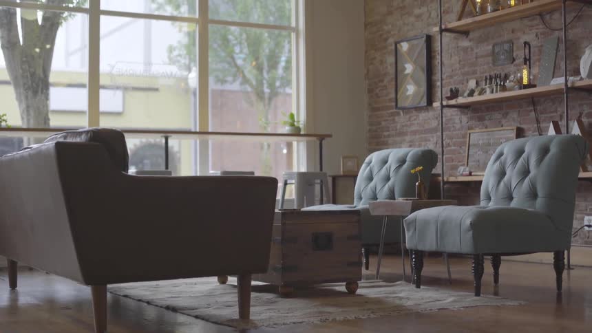 A living room with contemporary furnishing and decorations
