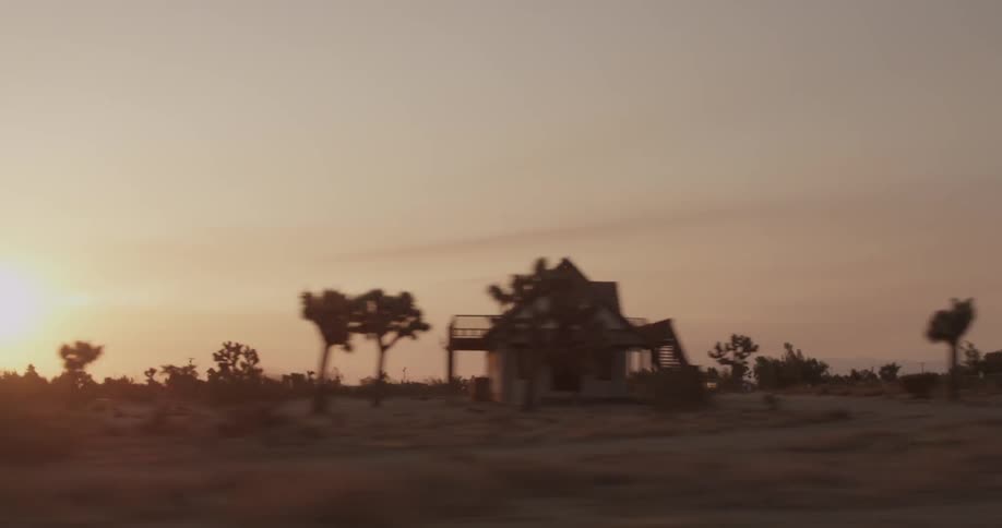 A car is driving in the country