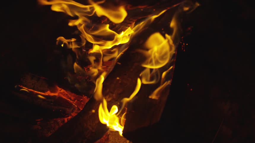 A piece of wood that is on fire