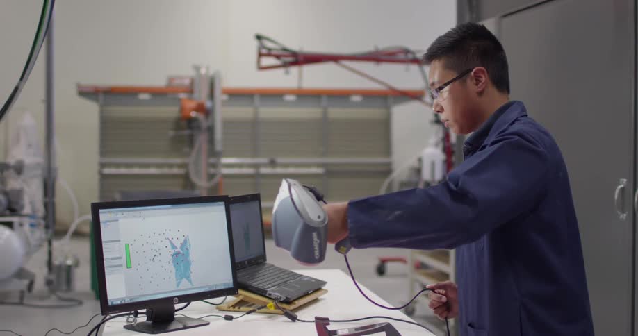 A person scanning something with a machine