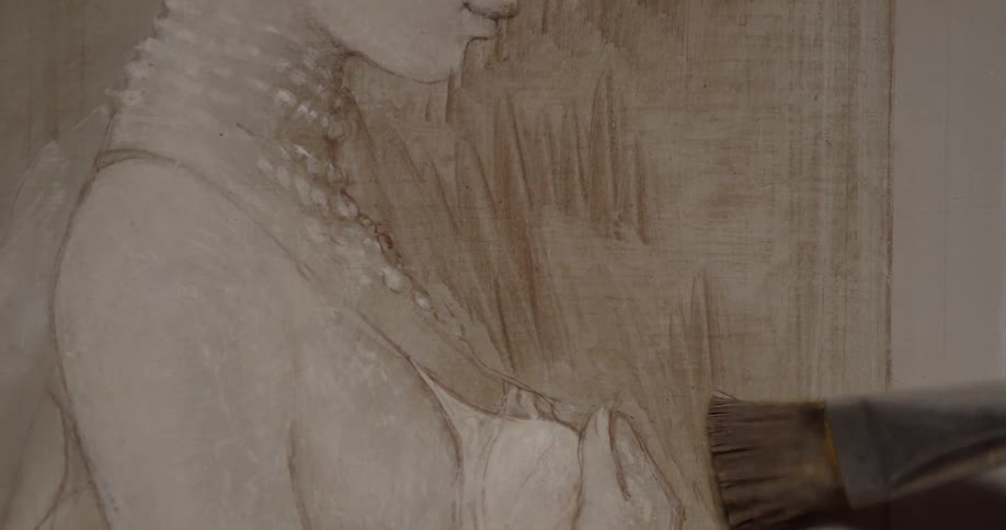 Brush strokes being made on a drawing