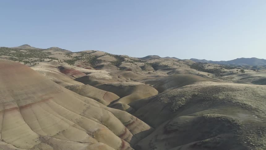 Some smooth rocky mountains forming a valley