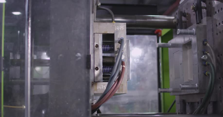 Industrial machinery sits on the floor of a factory