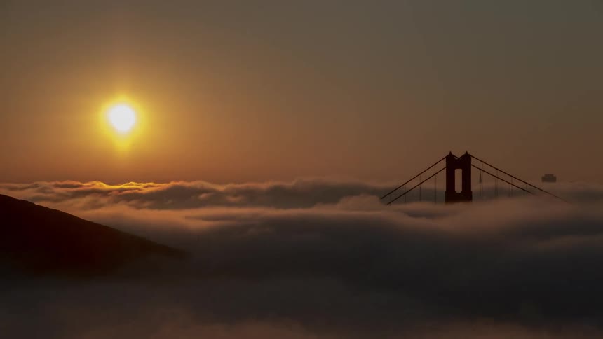 The sun is rising in the horizon
