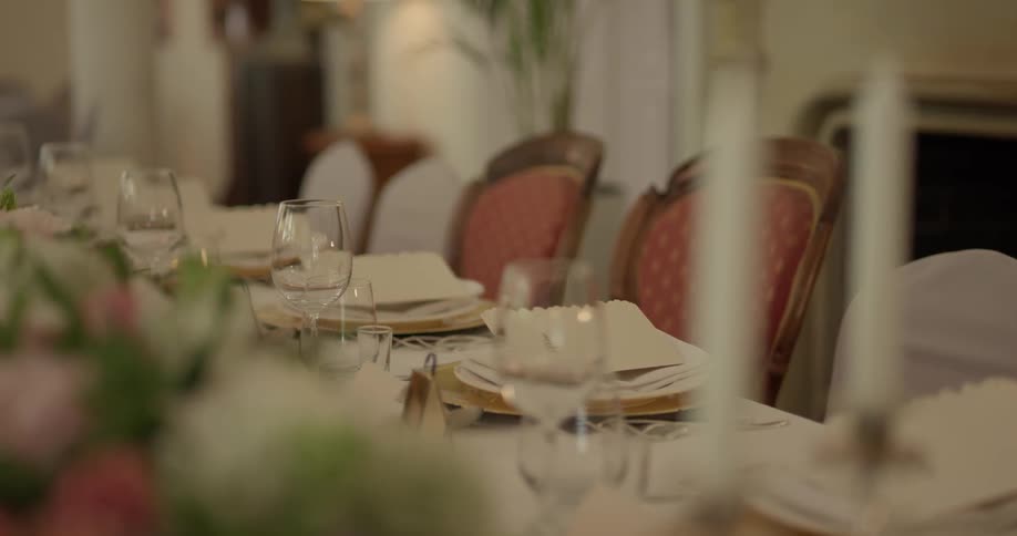 A table in a dining room that is all set
