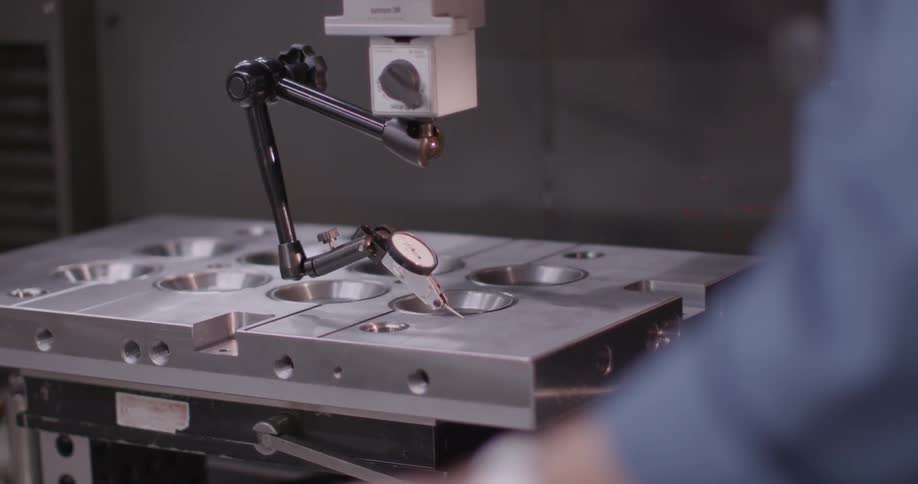 A person working a machine