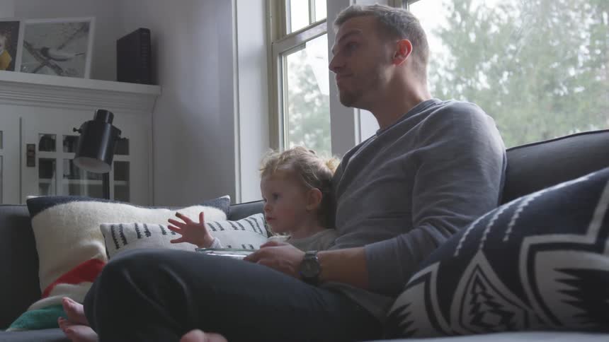 Father And Daughter Playing At Home