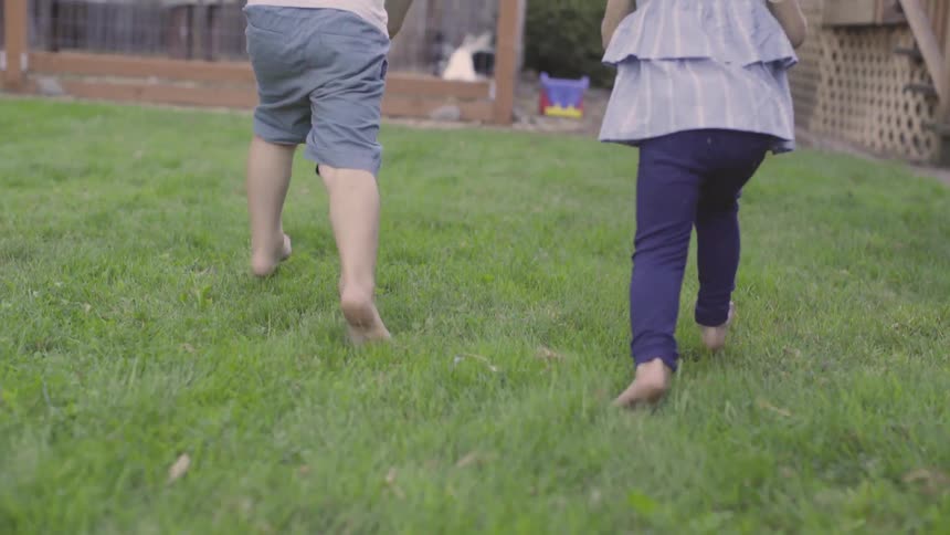 Kids Playing In Backyard