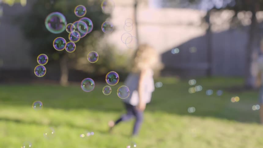 Kids Playing In Backyard