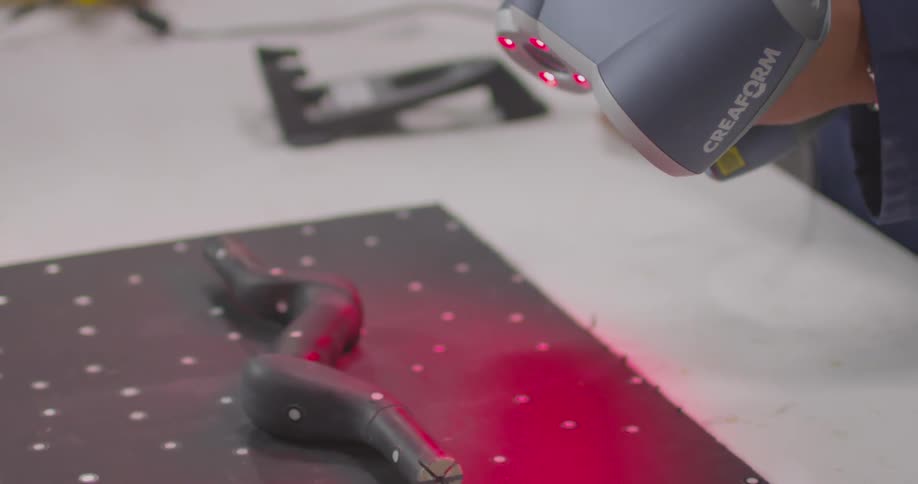 A person scanning something with a machine