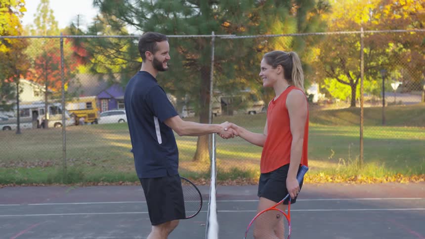 Couple Playing Tennis