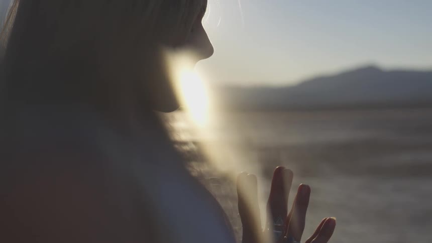 A woman holding her hands together
