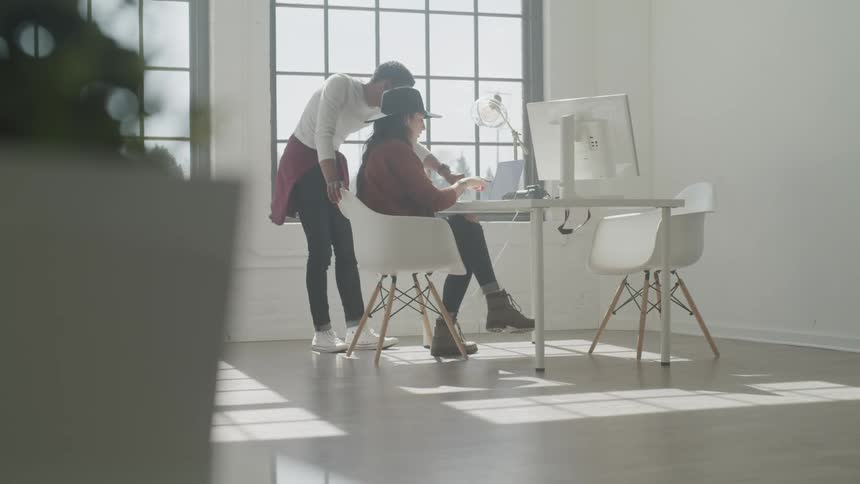 Young Creatives Working At Small Office