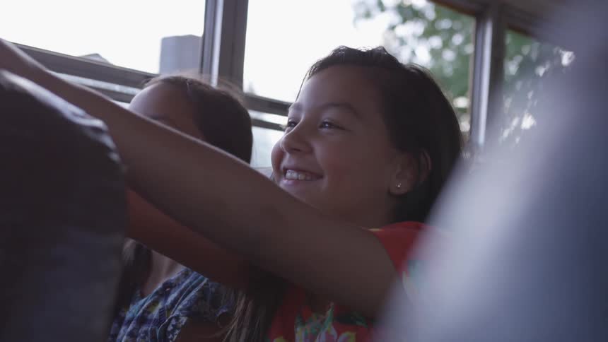 Children sitting on a bus