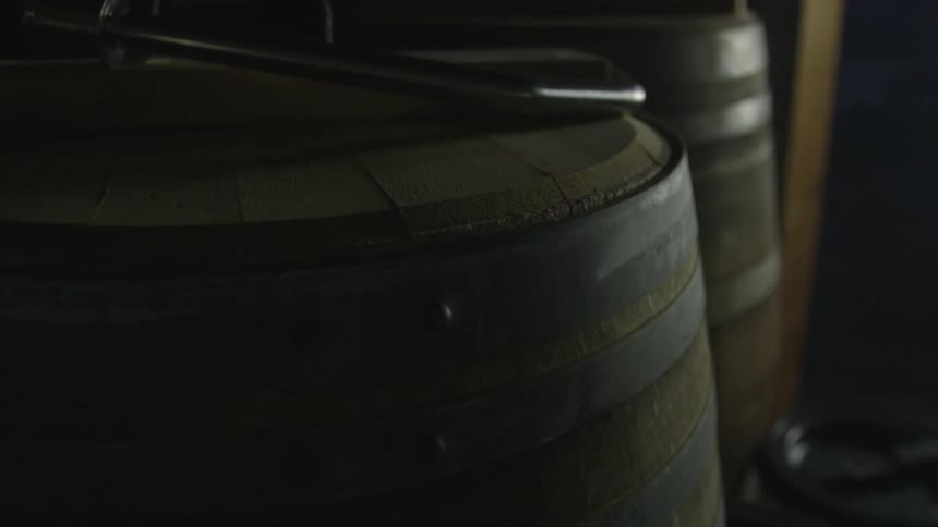 There are two barrels indoors