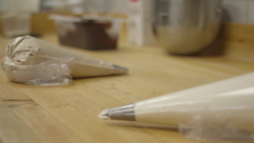 There is cooking supplies on a table