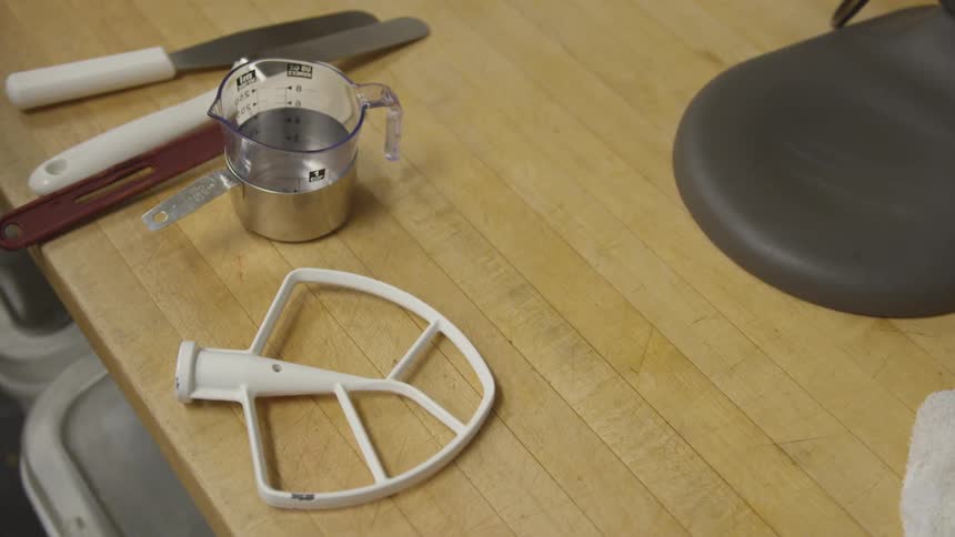 There are utensils on a table