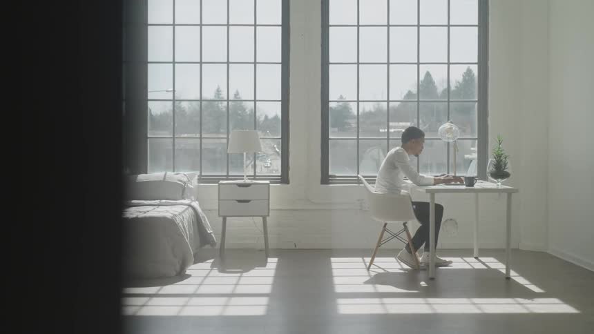 Man Working And Listening To Music At Home