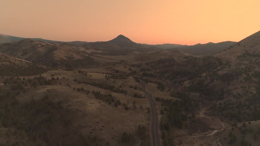 The sun is setting in the horizon