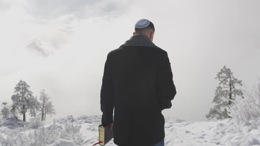 Jew walking on a snowy path