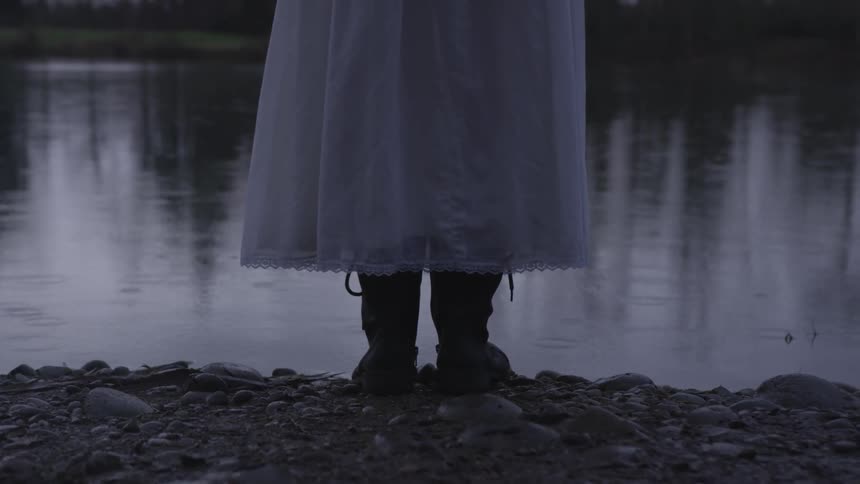 Girl Wading In Pond