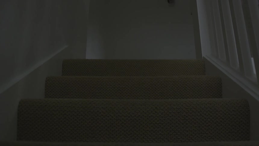 Stairs lead up to the next floor