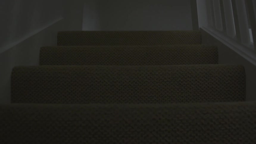A person walking up a flight of stairs