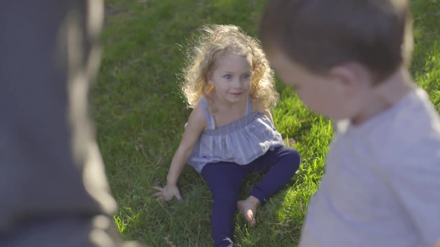 Children together on the grass