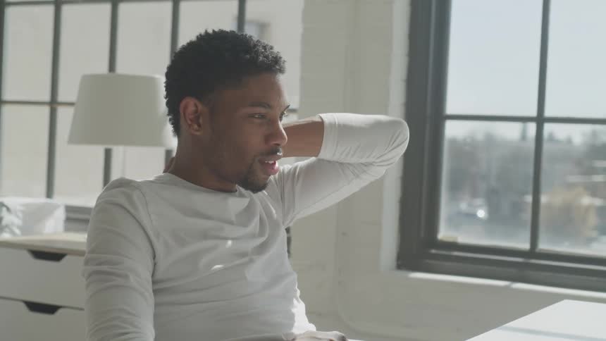 Man Working And Listening To Music At Home