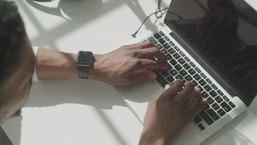 Man Working And Listening To Music At Home