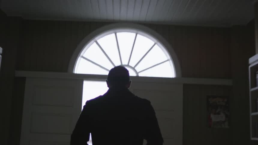 A person exiting a building