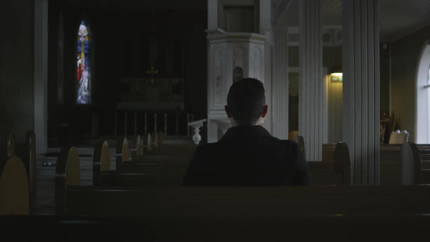A person sitting in a church