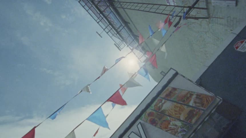 Streamers hang above a building