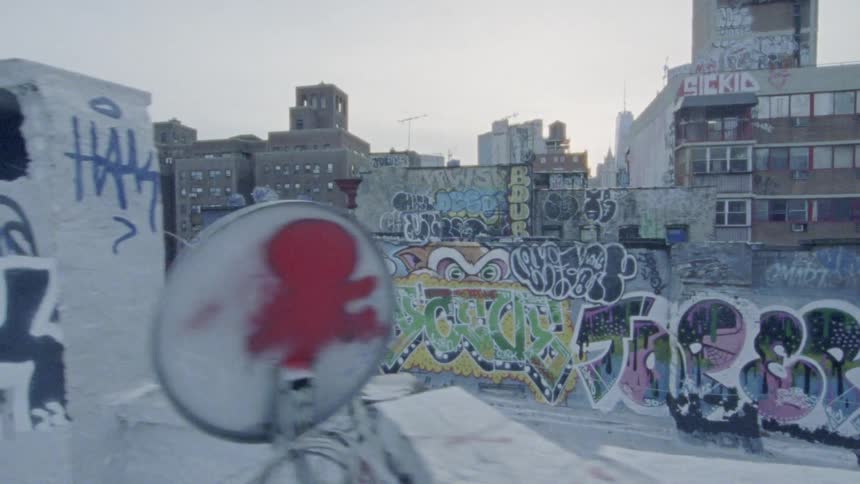 There is graffiti covering the city walls