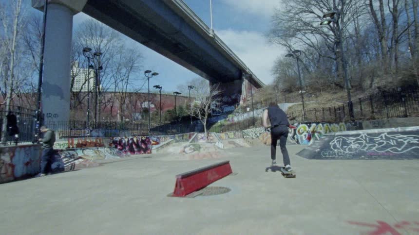 Skateboarder riding in a skate park