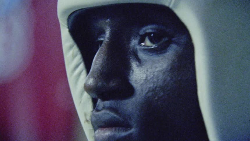 Man waiting for a boxing match to start