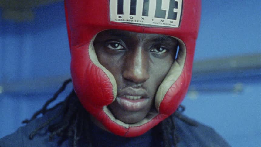 Young Boxer Training And Fighting