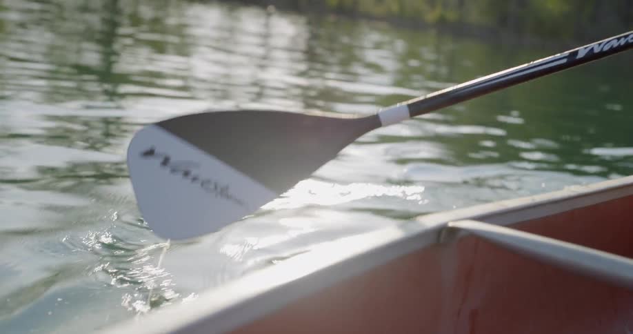 Person paddling in a small boat