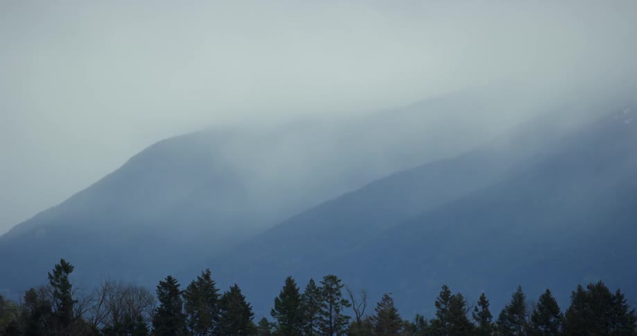 Mountains covered by thick clouds