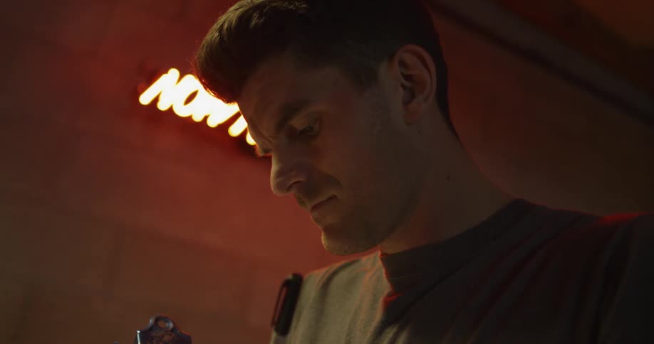 A man is writing with a marker
